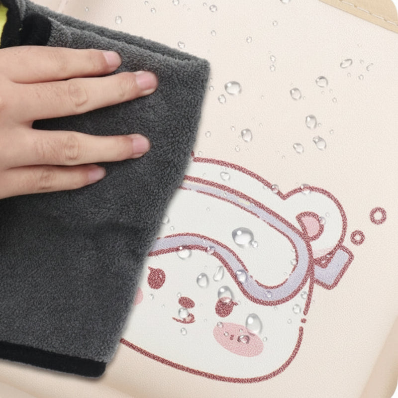 Cloth wiping water droplets from the bear-patterned PU leather surface