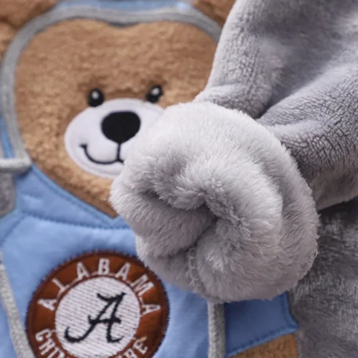 Rolled gray cuff beside the textured bear design on the sweatshirt