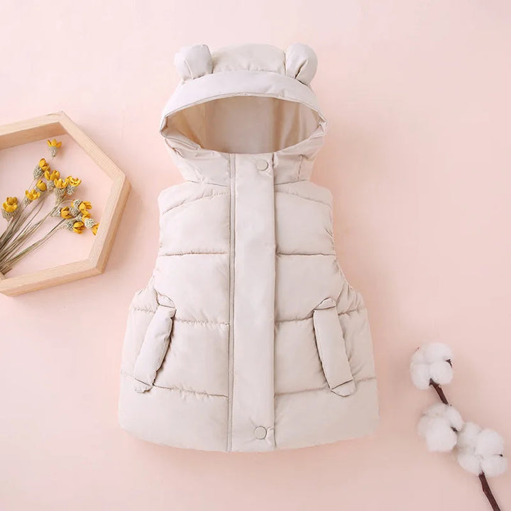 Beige hooded puffer vest with rounded bear ears and front pockets