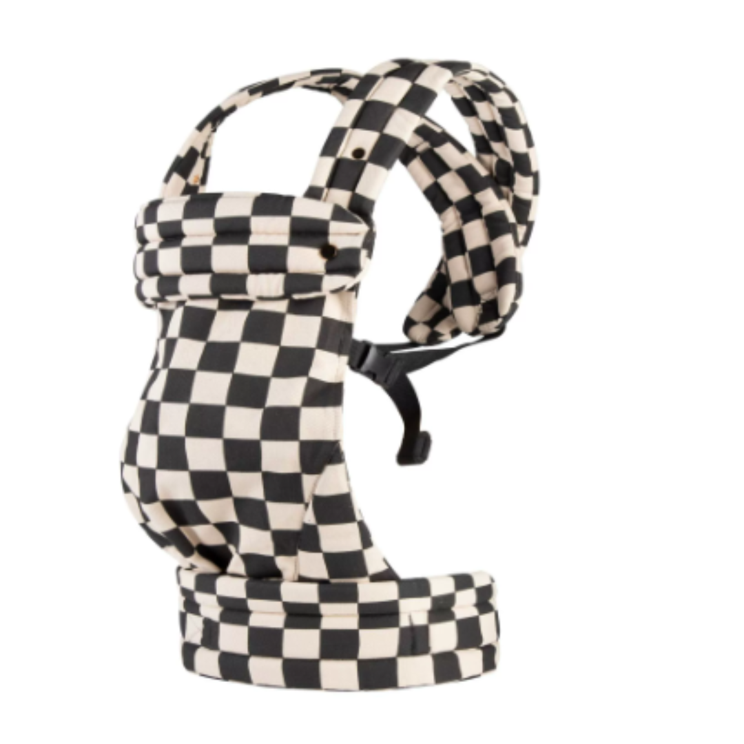 Beige-and-black checkerboard baby carrier with padded shoulder straps and an adjustable waist belt