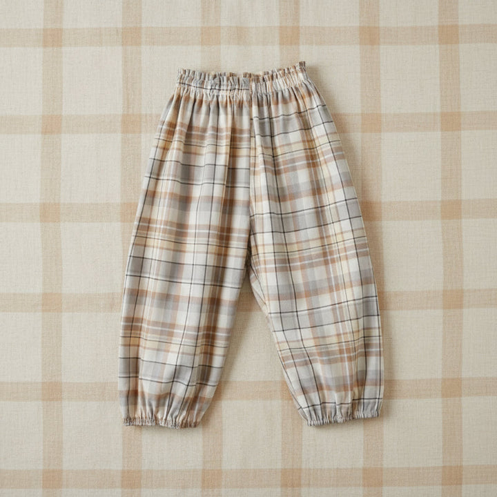 Beige and brown checkered harem pants with a gathered waist and ankle cuffs.