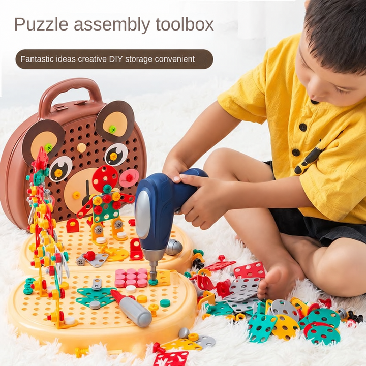 Child using a blue play drill to attach colorful pieces to a beige building case