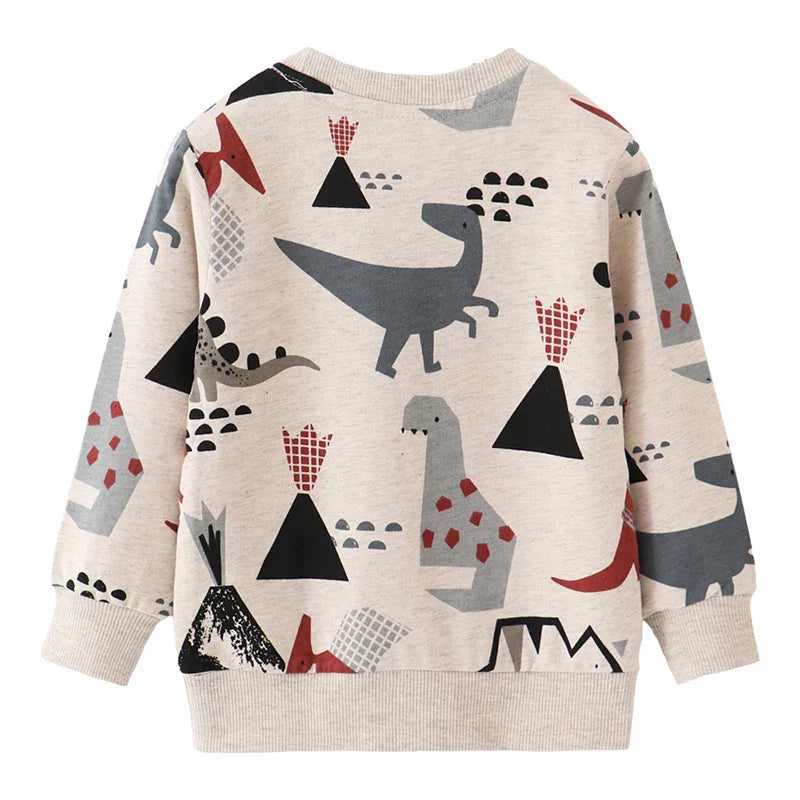 Beige long-sleeve sweatshirt with dinosaurs and geometric shapes across the front