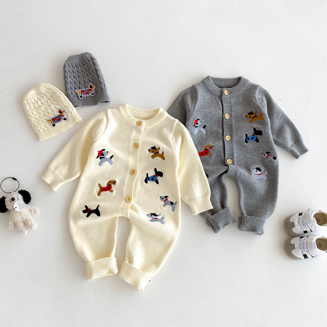 Beige and gray knitted baby jumpsuits with colorful dog motifs and front buttons