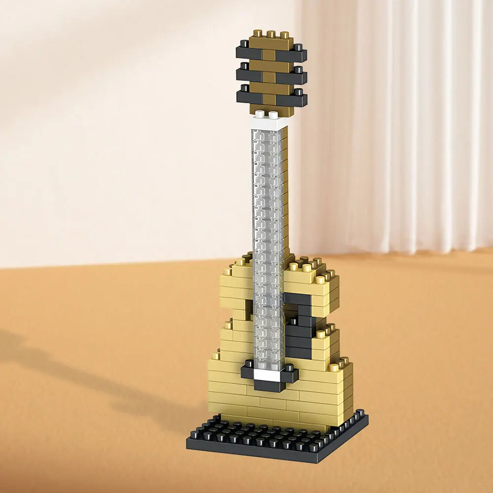 Beige miniature guitar built from interlocking blocks on a black base