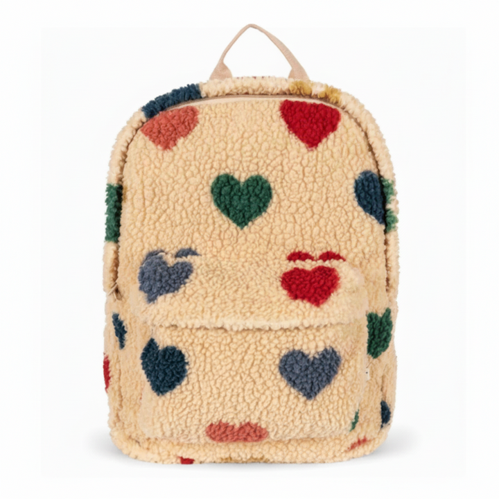 Front view of the beige teddy backpack with colorful hearts and a zippered front pocket