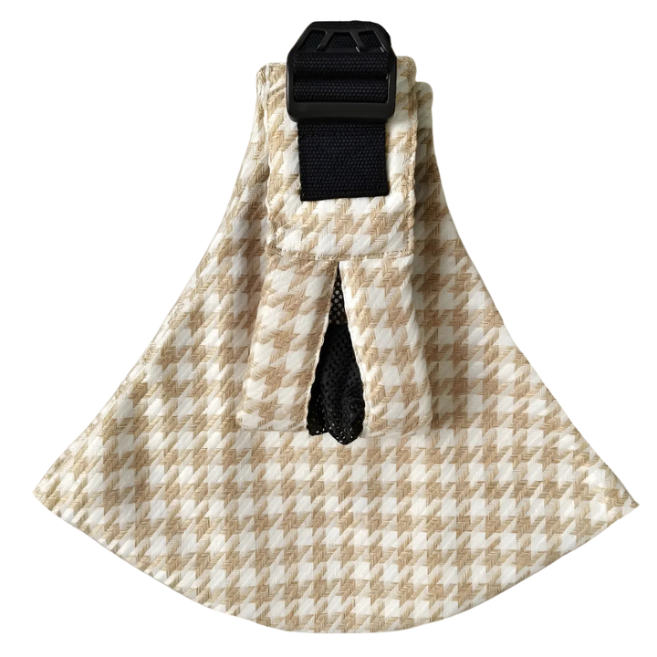 Beige-and-white houndstooth hip carrier with a black adjustable strap
