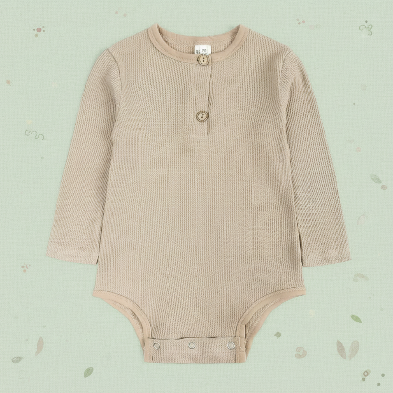 Beige neutral ribbed long-sleeve baby bodysuit with neckline buttons and bottom snaps