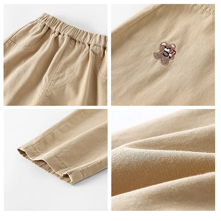 Close-ups of beige pants showing the elastic waist, embroidered motif, hem, and fabric texture.