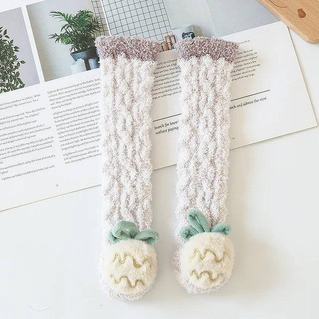 Beige long socks with pineapple decorations and contrasting cuffs