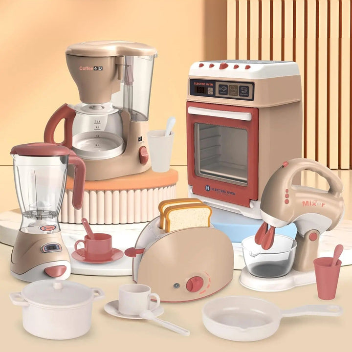 Beige and pink toy kitchen appliances with a blender, coffee maker, toaster, mixer, and play cookware.