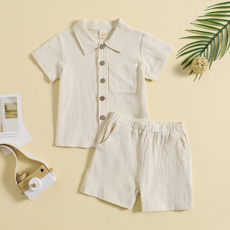 Beige button-front shirt with a chest pocket and matching shorts