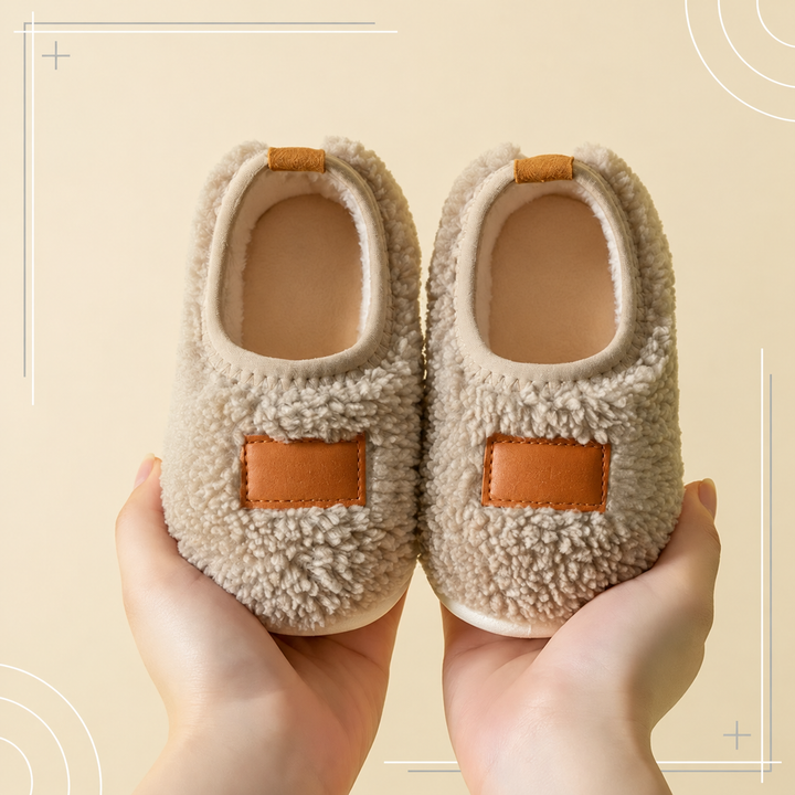 Beige textured slippers with tan front patches and cream-colored trim