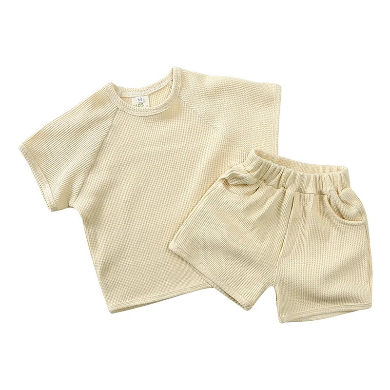 Beige short-sleeve T-shirt and matching elastic-waist shorts set