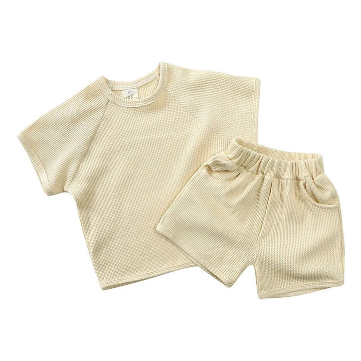 Beige short-sleeve T-shirt and matching elastic-waist shorts set