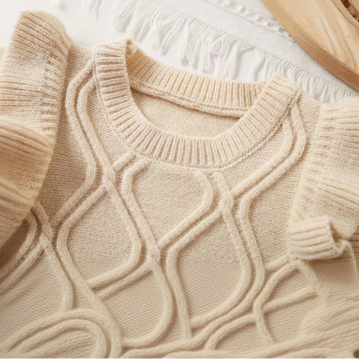 Close-up of the beige vest&