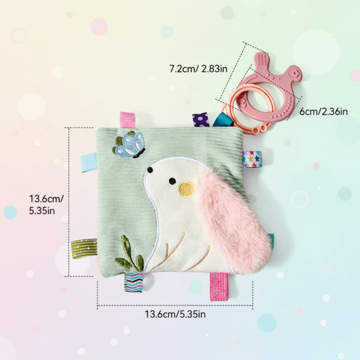 Bird-design cloth book with fabric tabs, a pink teething ring, and size measurements