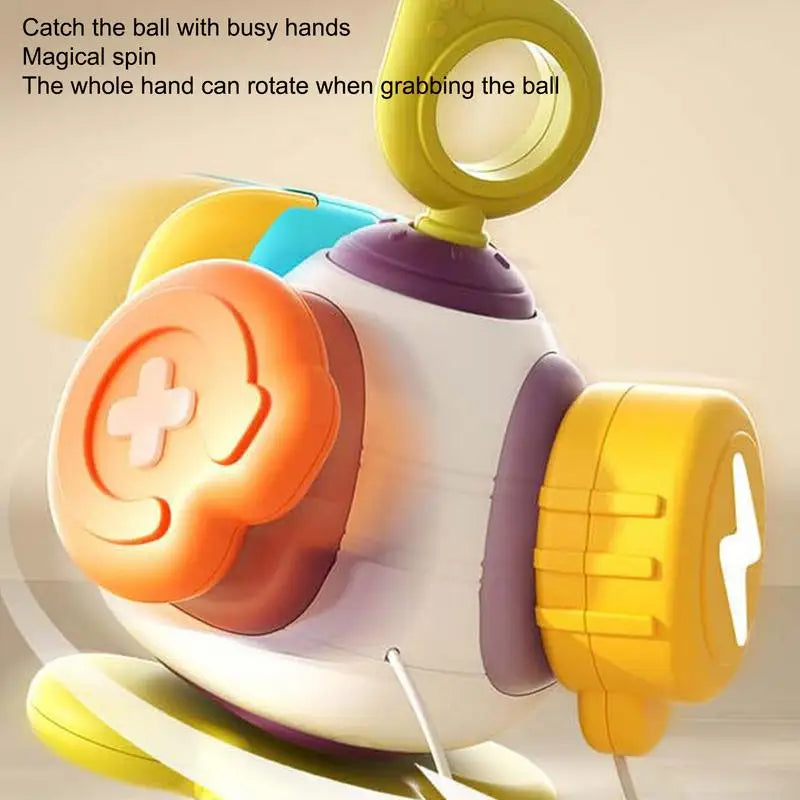 Side view of the bird sensory toy showing raised shapes and textured yellow and orange discs