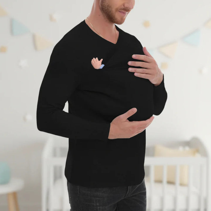 Man wearing a black V-neck baby carrier shirt with a baby in the front pouch.