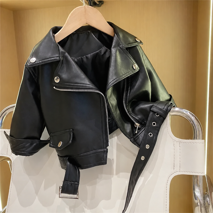 Open black faux leather jacket showing the lining, fold-over collar, and waist belt