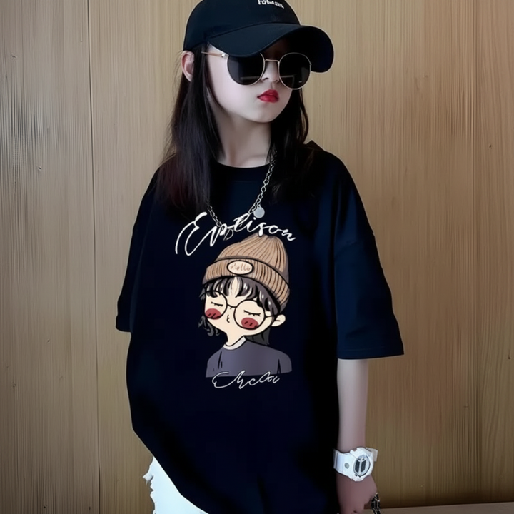 Girl wearing a black cartoon-print T-shirt with a black cap and sunglasses