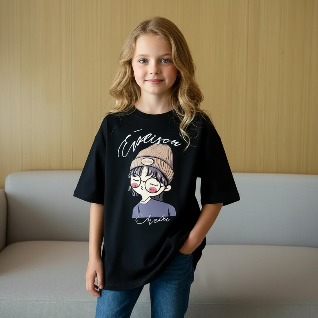 Girl modeling the black cartoon-print T-shirt with jeans