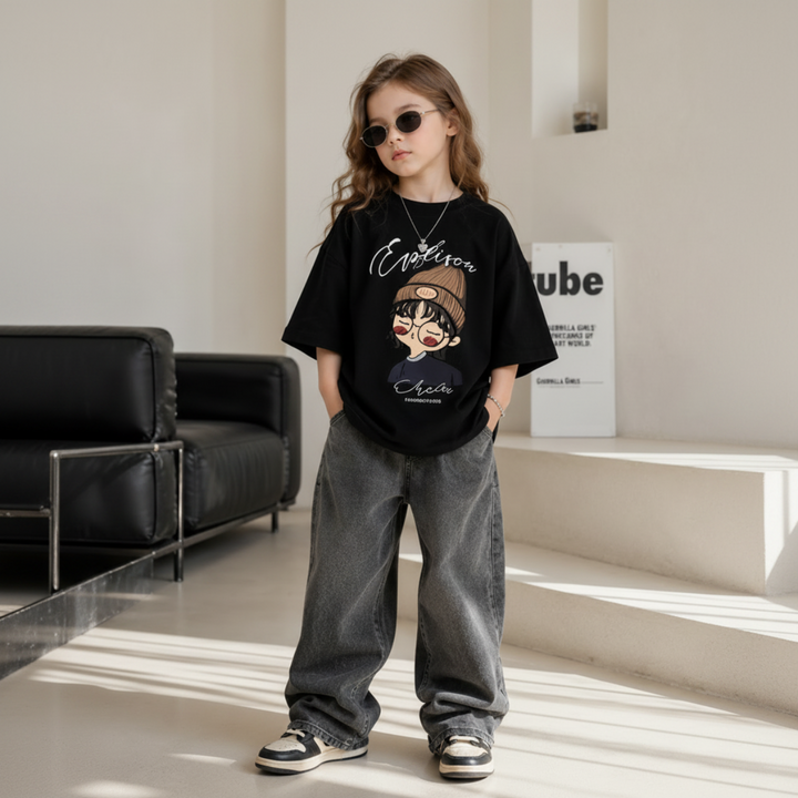 Girl wearing a black oversized cartoon T-shirt with wide-leg gray jeans