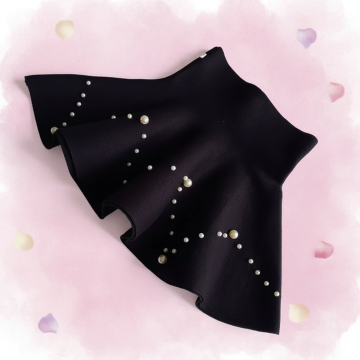 Black knit skirt laid diagonally with chevron patterns of pearl-style beads