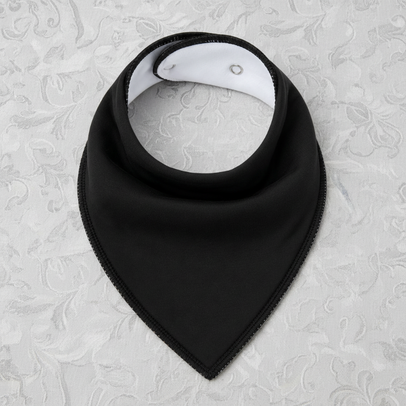 Black cotton bandana bib with stitched edges and adjustable snap buttons