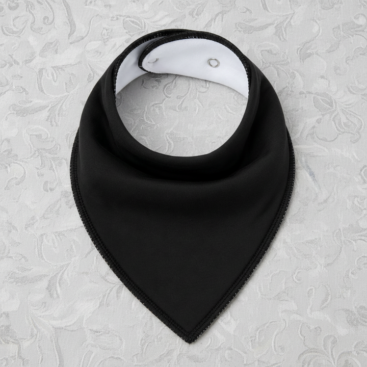 Black cotton bandana bib with stitched edges and adjustable snap buttons