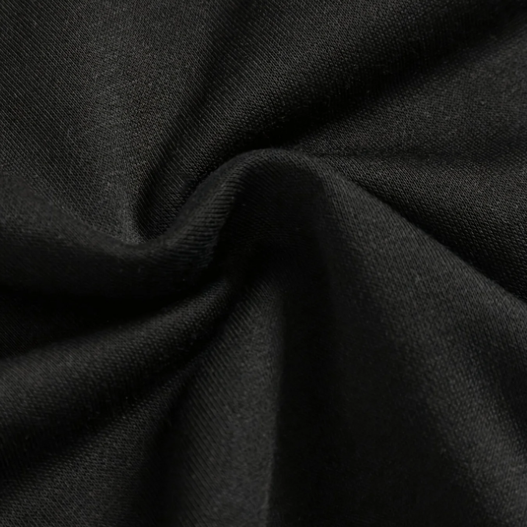 Close-up of the black cotton-polyester hoodie fabric.