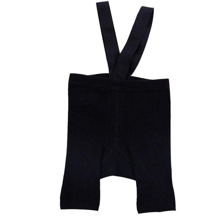 Black ribbed suspender shorts with shoulder straps on a white background.