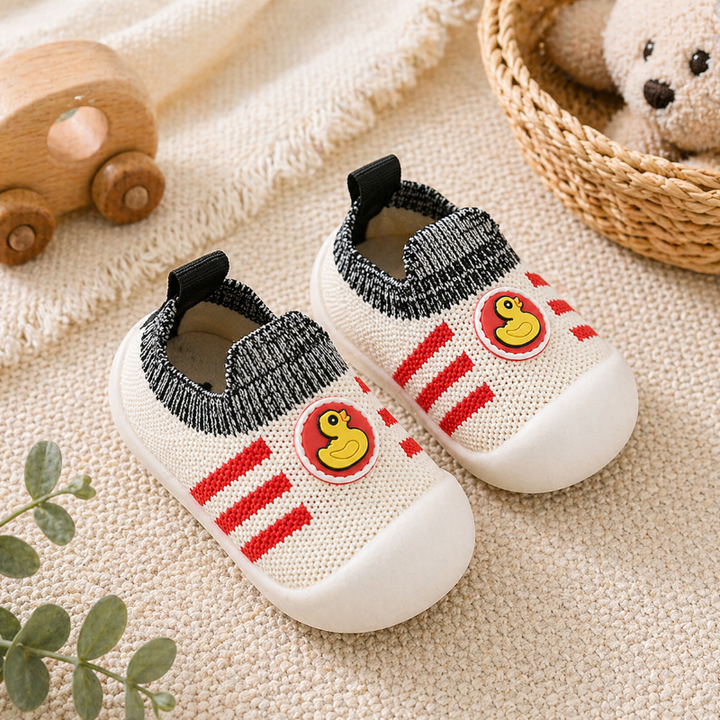 Red-striped duck sock shoes with black knit cuffs and white toe caps.