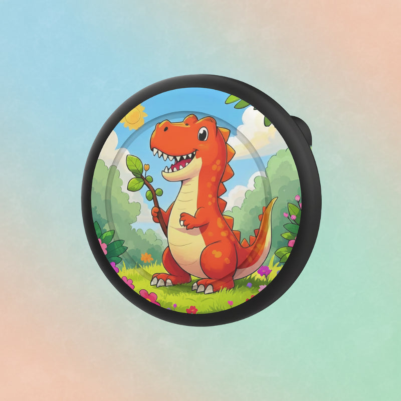 Black-rimmed AirTag brooch case with an orange dinosaur design