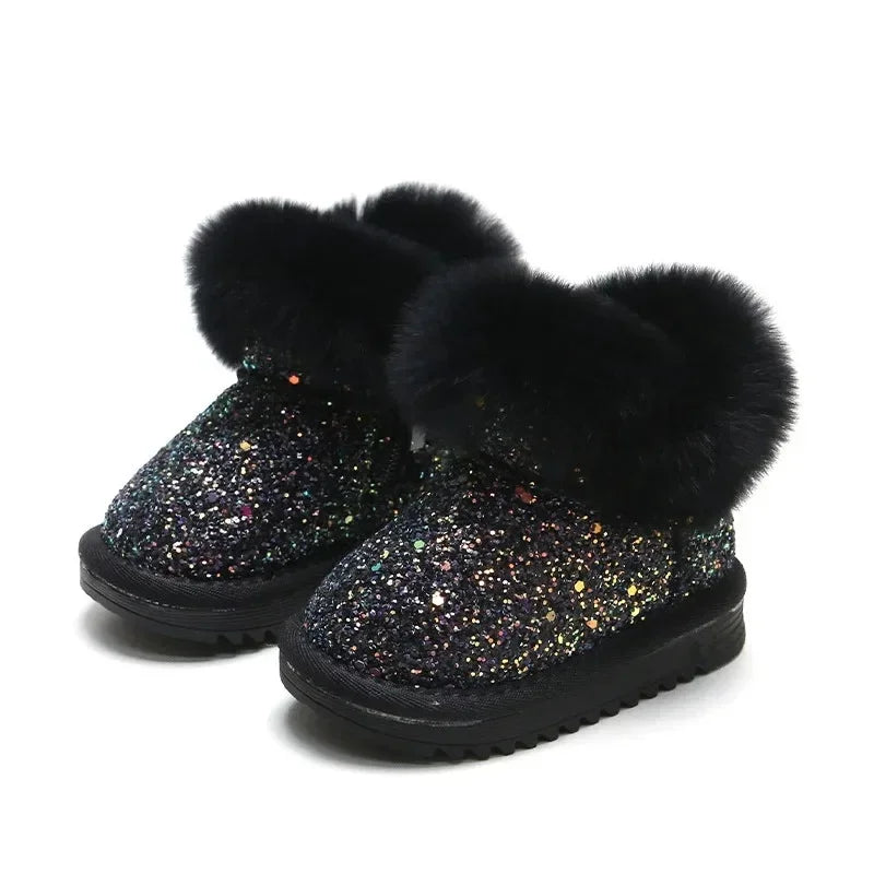 Black glitter winter boots with fluffy black cuffs and ridged soles.