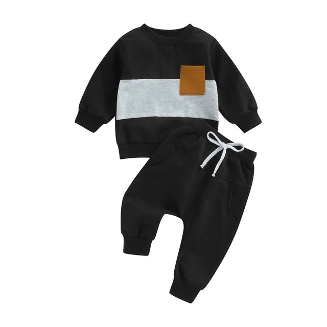 Black sweatshirt with a gray chest stripe and tan pocket beside black drawstring joggers