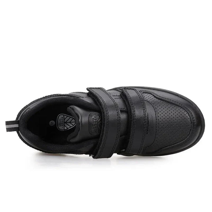Top view of a black sneaker with two straps and a perforated toe panel