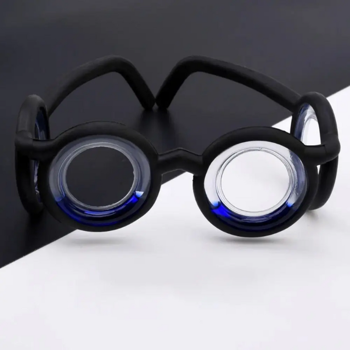 Black lens-free travel glasses with round blue liquid chambers
