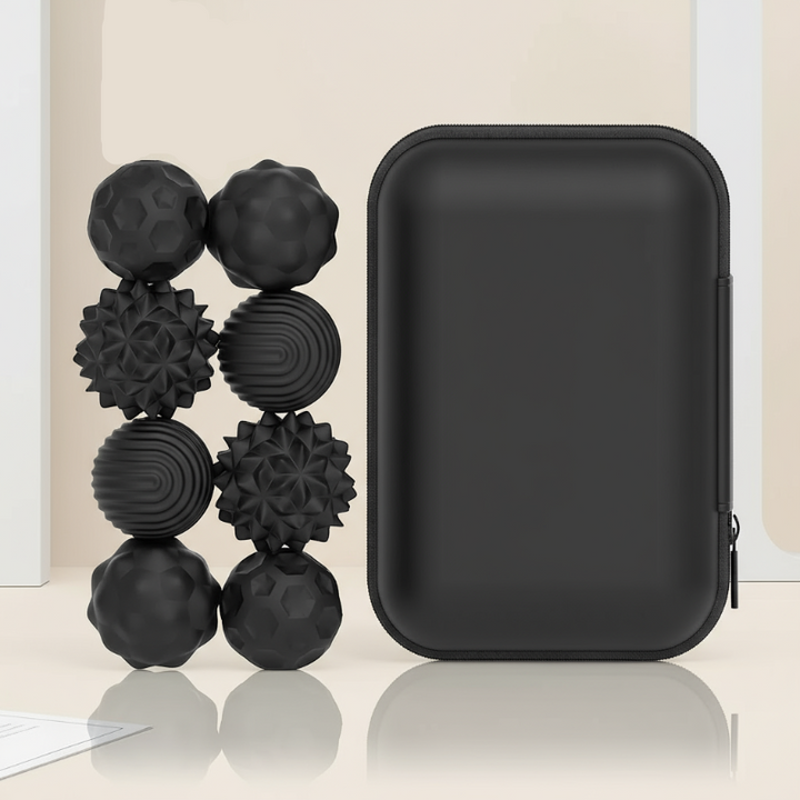 Eight medium black textured magnetic beads beside a rectangular black zippered case