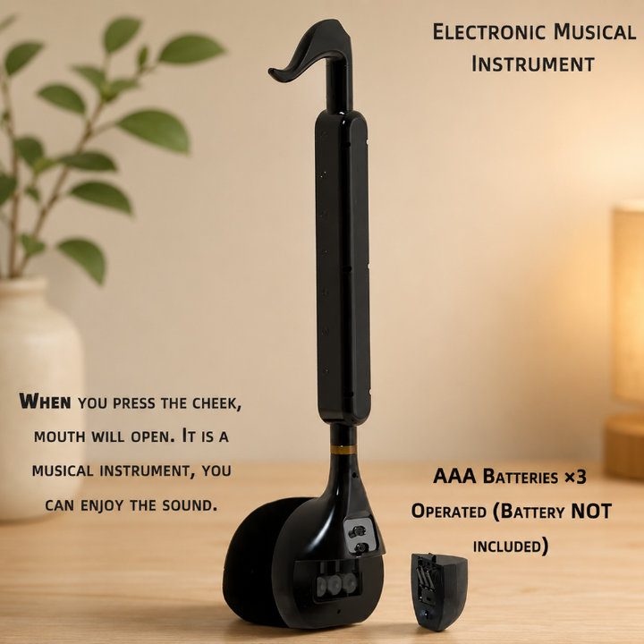 Black musical-note toy viewed from the back with its battery compartment open.