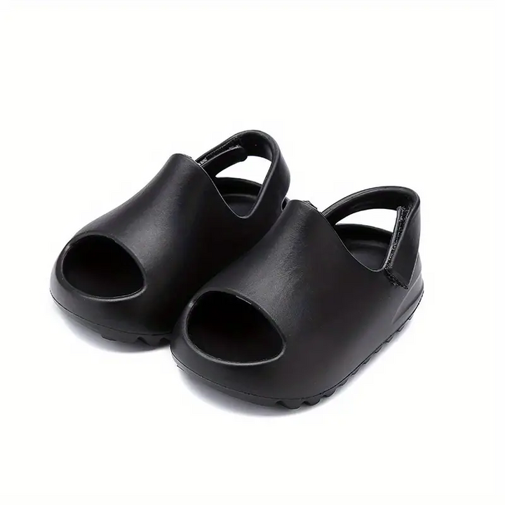 Pair of black EVA foam sandals with open toes and heel straps.