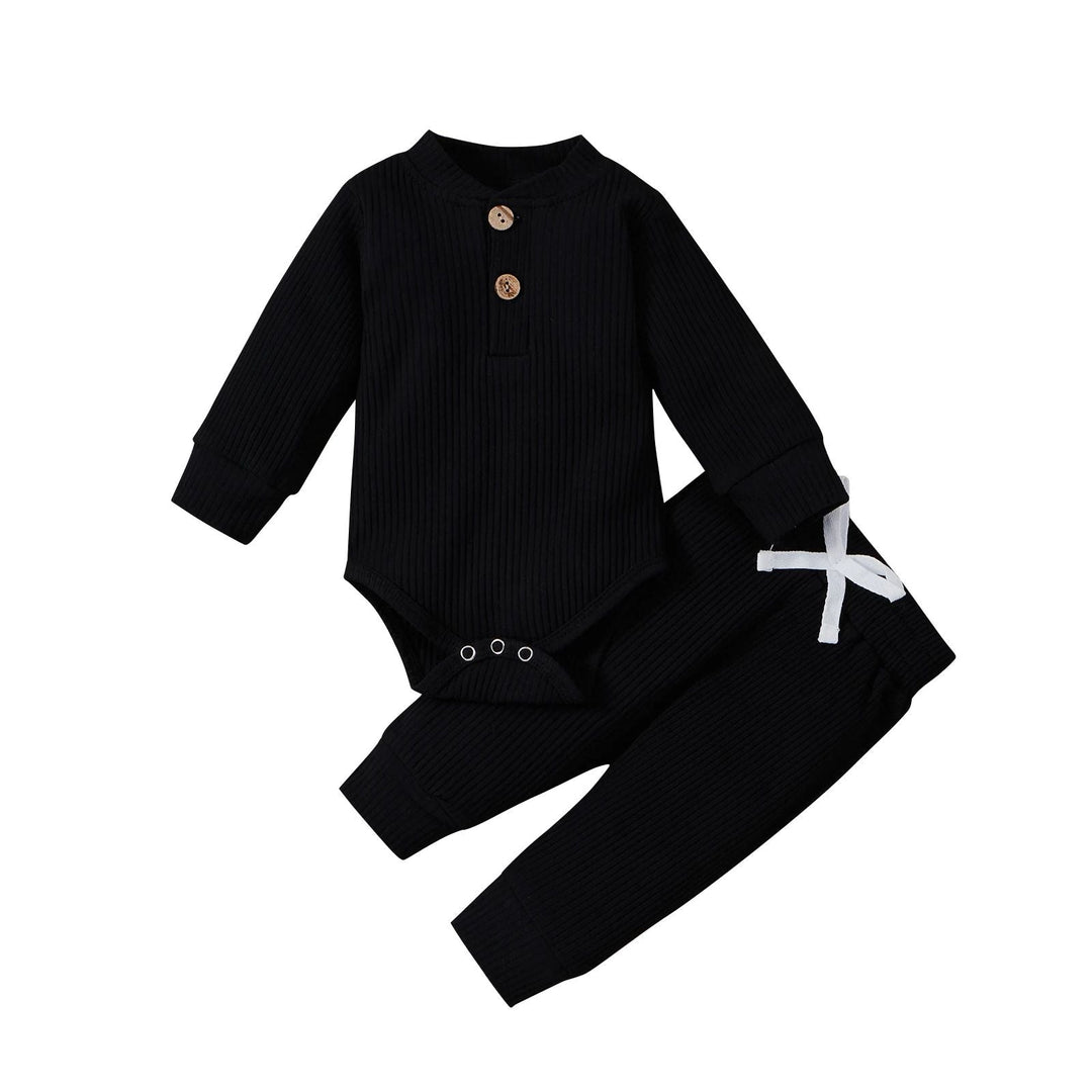 Black ribbed baby bodysuit and matching pants with a white waist tie
