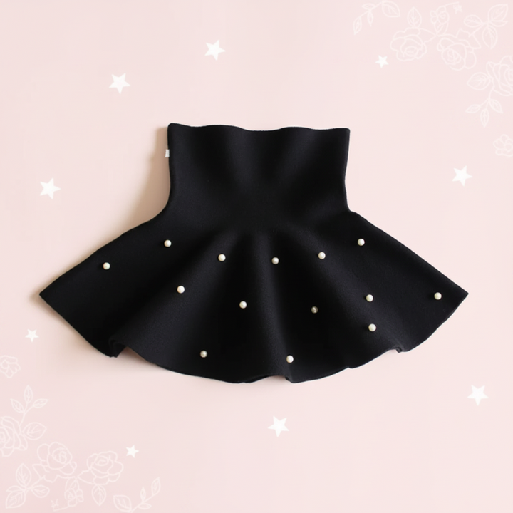 Black A-line knit skirt with scattered pearl-style beads and a wide waistband