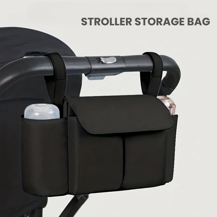 Black stroller organizer attached to a stroller handle, with bottles in the side holders