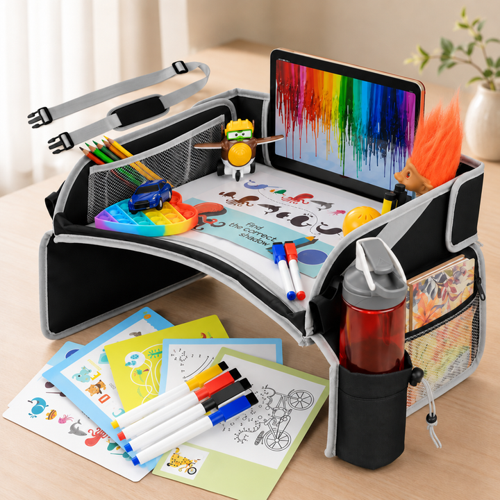 Black travel tray with raised sides and storage pockets, shown with activity supplies