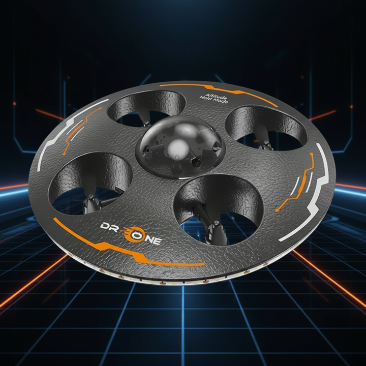 Black RC UFO drone with orange accents and four recessed propellers