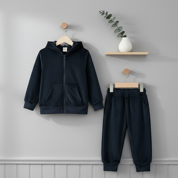 Black zip-up hoodie and matching jogger pants displayed on hangers