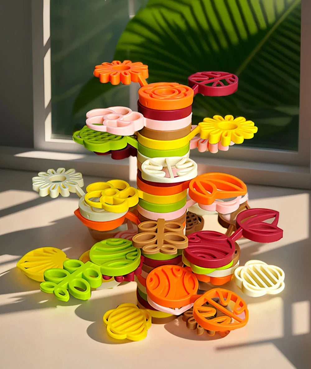 35-piece stacking set built into a colorful tower with flower- and leaf-shaped platforms