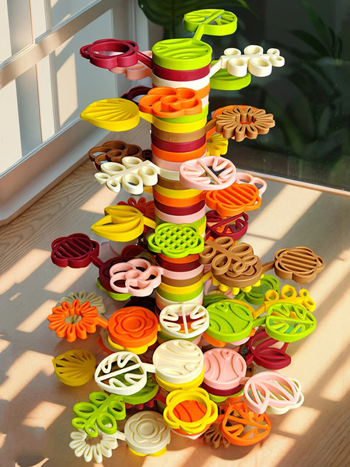 70-piece stacking set arranged as a tall tower with colorful flower and leaf shapes