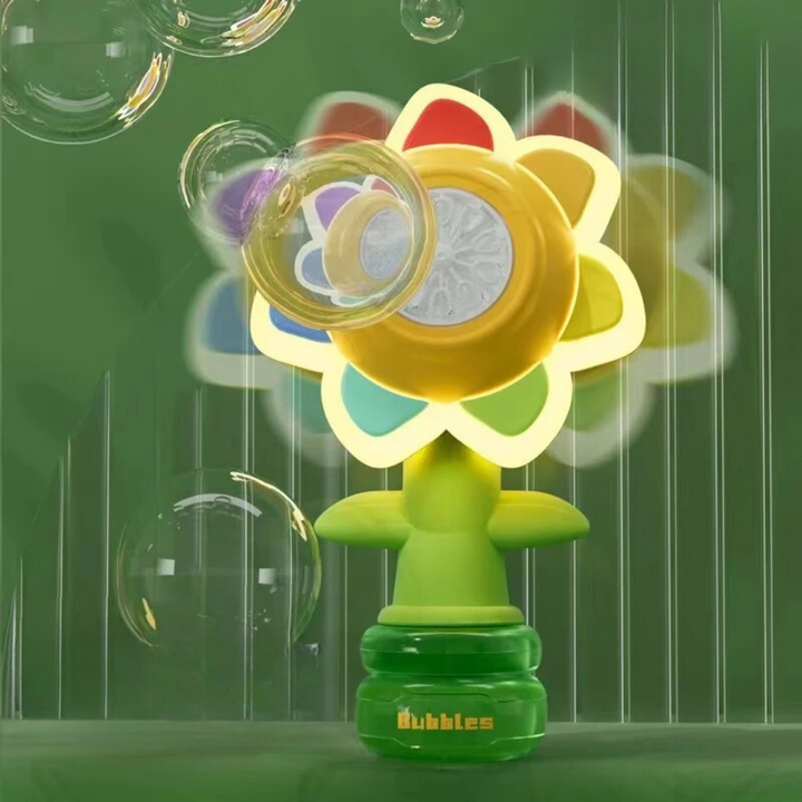 Yellow flower-shaped bubble blower with colorful petals, a green stem, and bubbles around the moving head